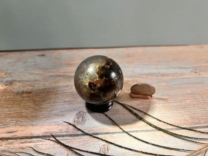 Garnet w/mica and quartz sphere